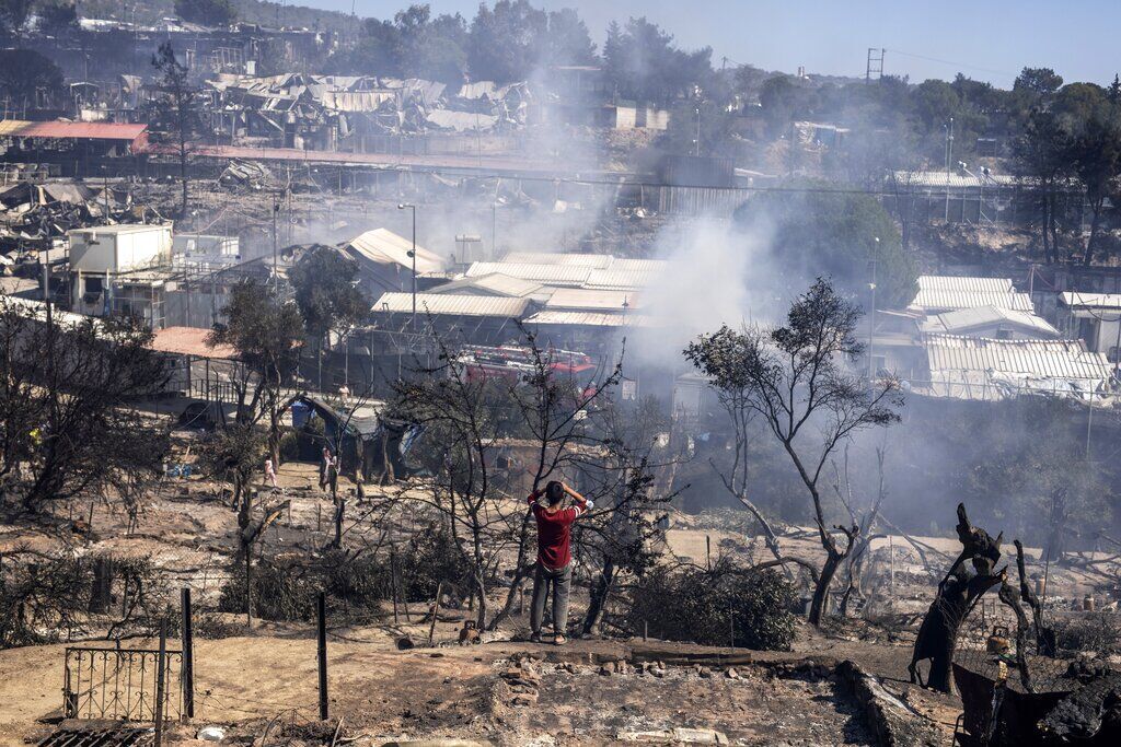 APTOPIX Greece Migrant Camp Blaze